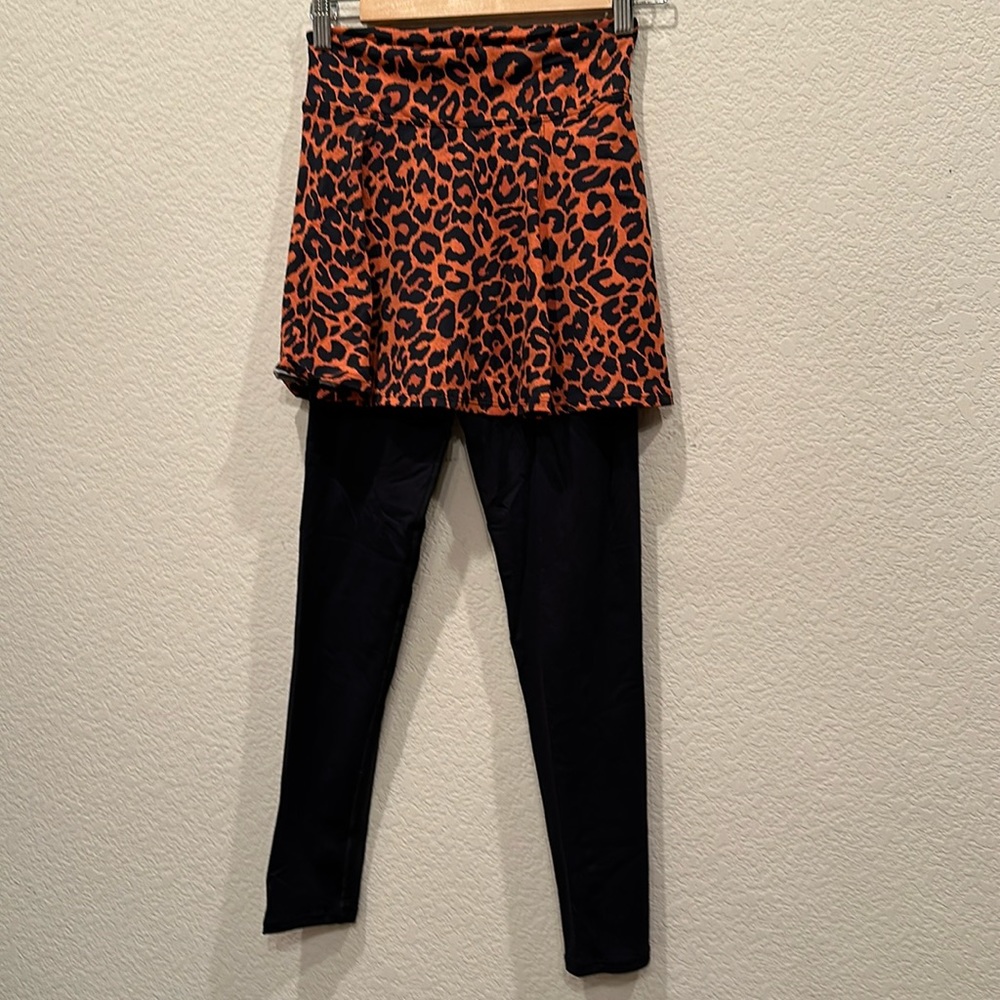 Tennis skirt with built in legging /like new/cheetah print. Size small